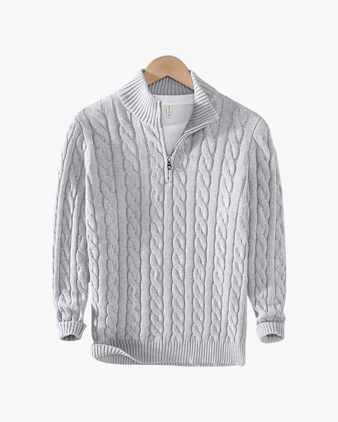 Suéter com zíper e gola alta inspirado na tradição britânica. Ideal para compor looks clássicos e sofisticados.