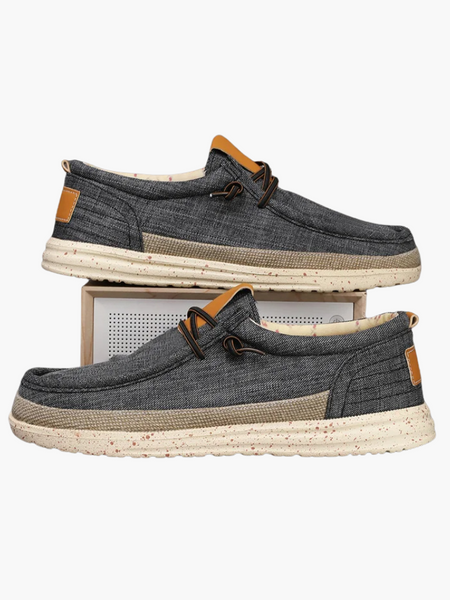 Mocassim cinza com lona respirável e estilo italiano casual refinado.